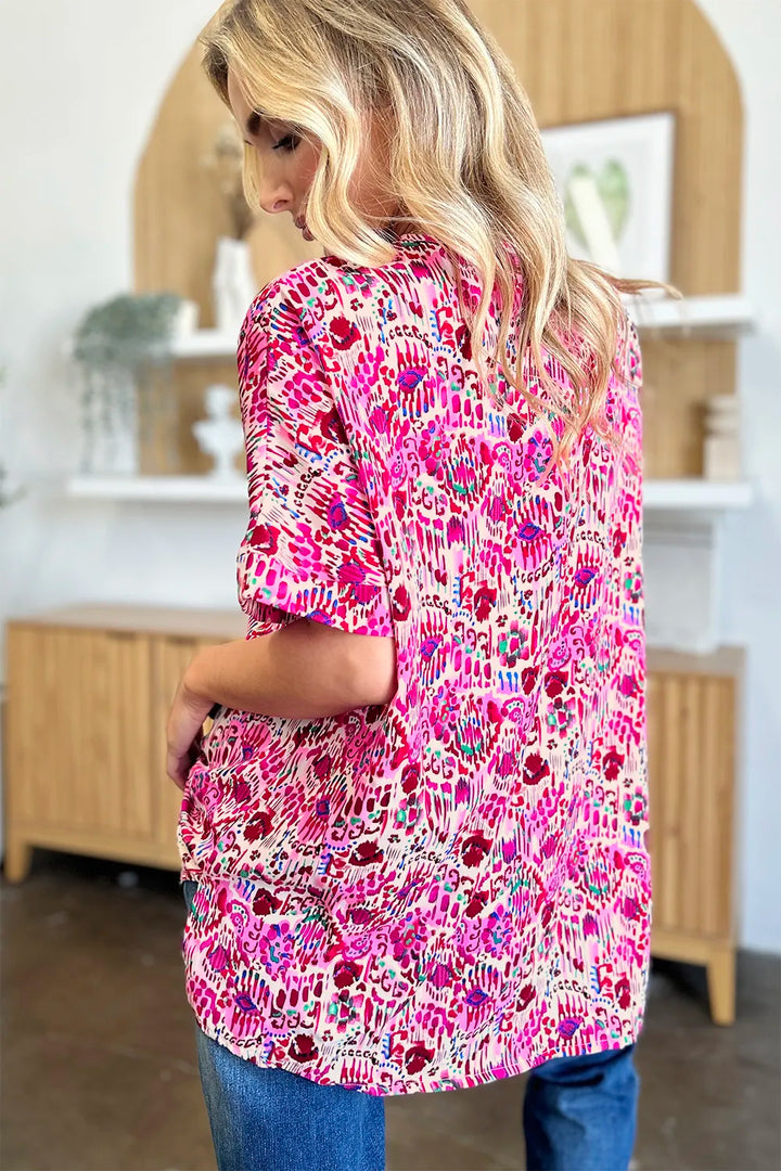 Abstract print V-neck short sleeve tunic blouse