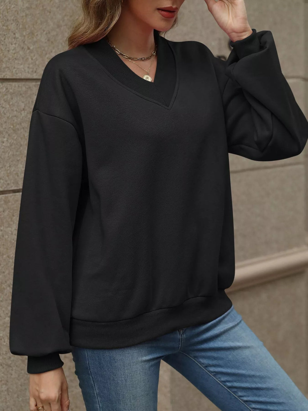 V-neck drop-shoulder pullover sweatshirt with ribbed trim