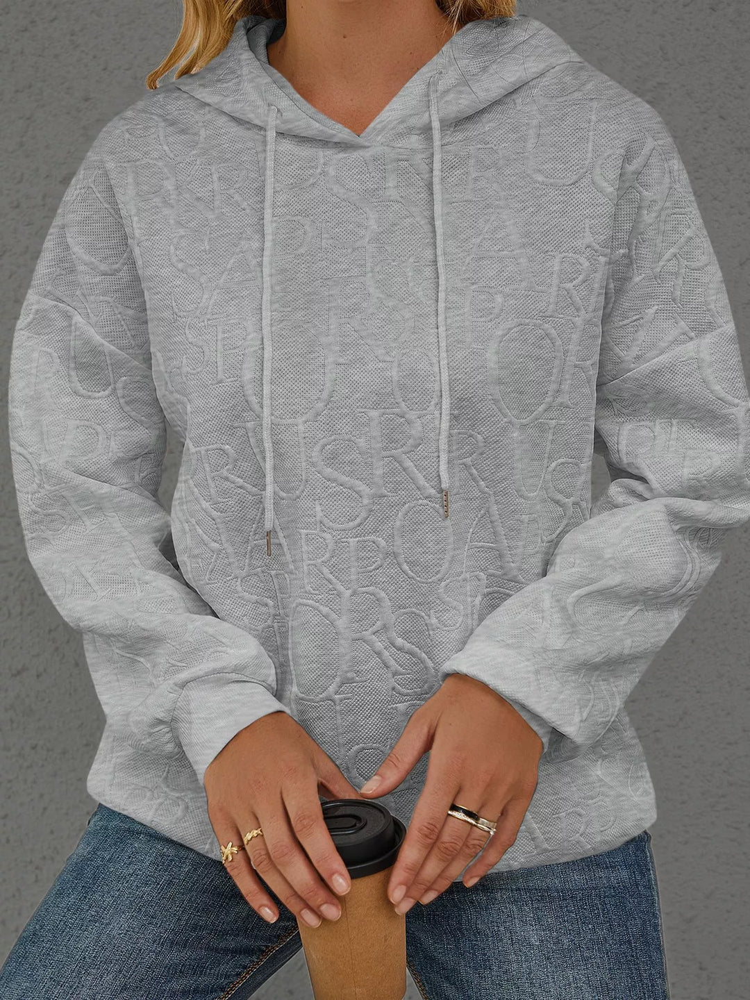 Embossed lettering drawstring pullover hoodie