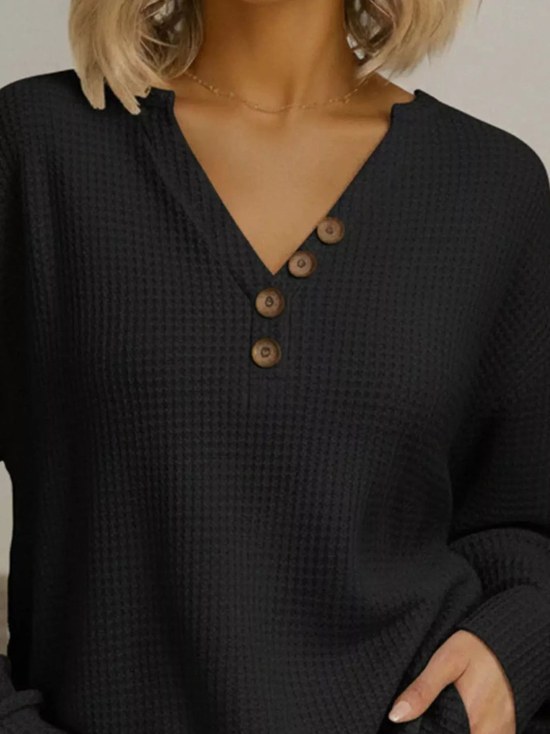 Waffle knit henley top with V-neck button placket