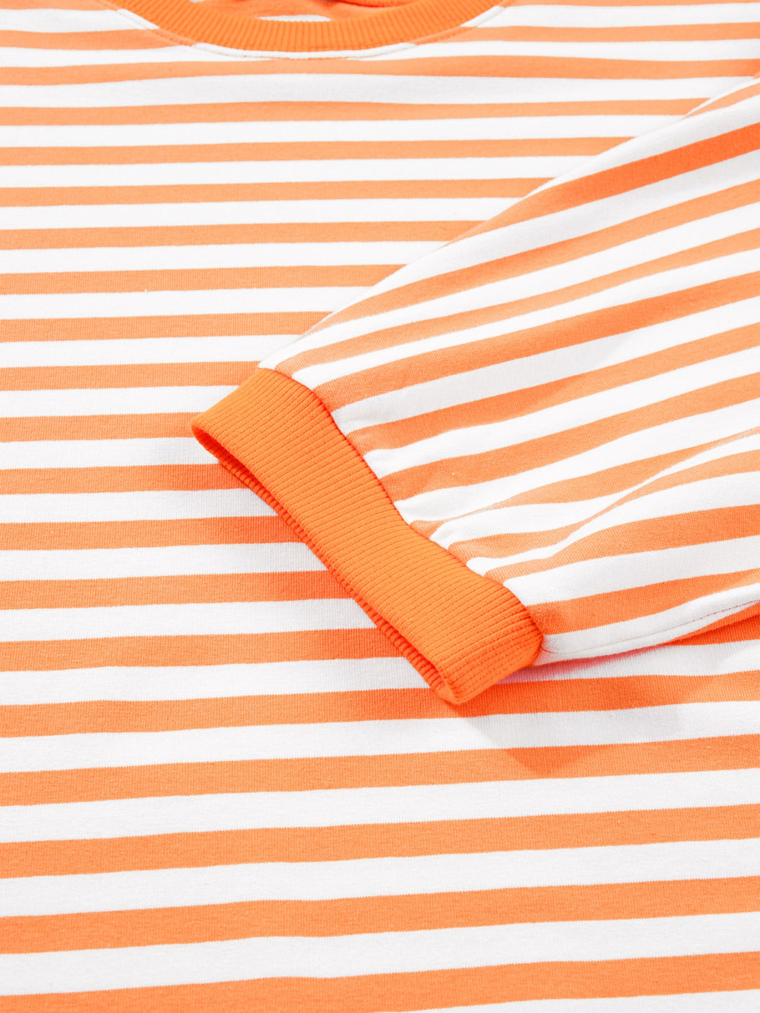 Striped exposed-seam 3/4 sleeve pullover top