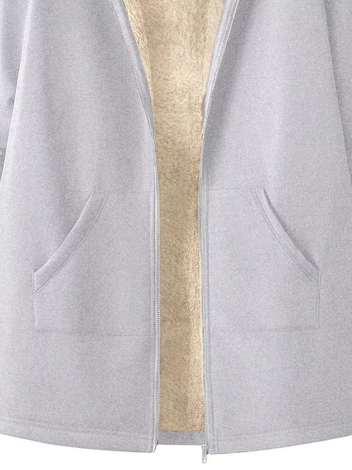 Sherpa-lined hooded zip longline jacket with pockets
