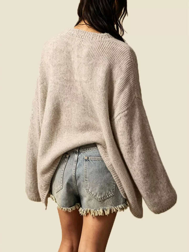 Oversized V-neck button-down knit cardigan with textured trim