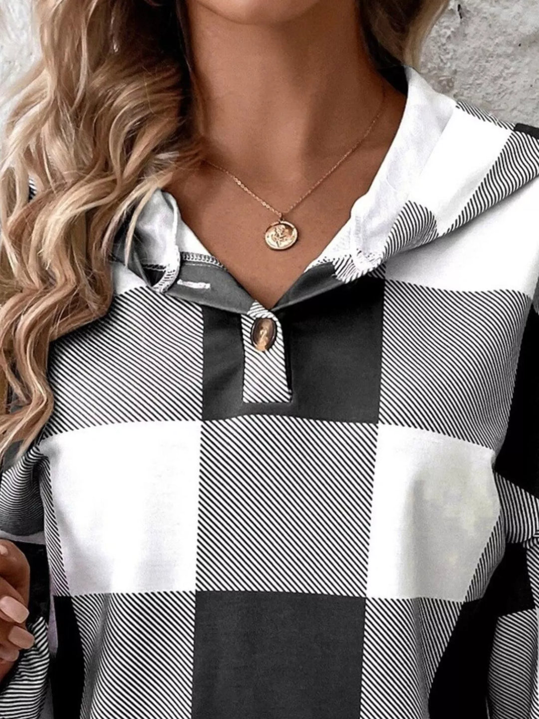 Buffalo plaid button-neck hoodie with drawstring hood