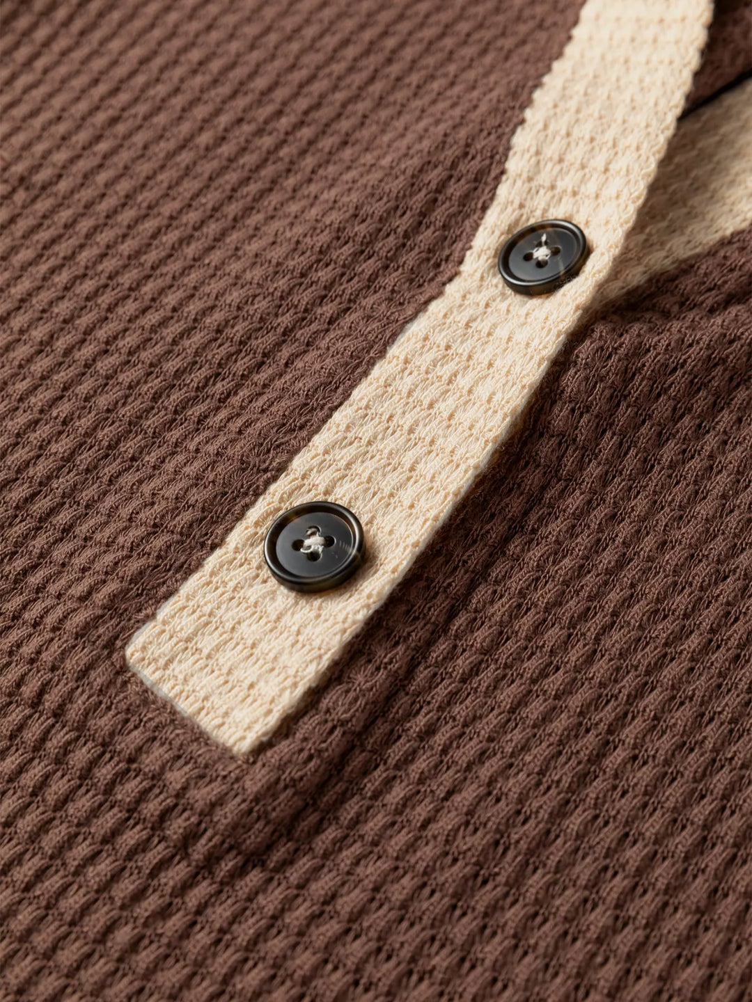 Waffle knit half-button hooded pullover with contrast trim