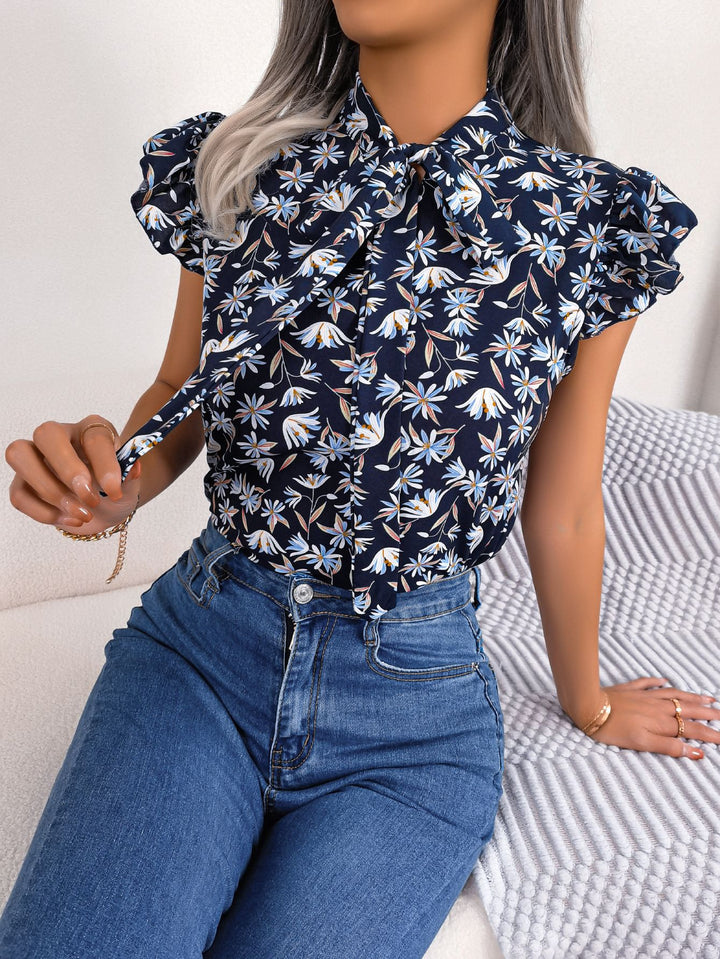 Dark Blue Floral tie-neck blouse with ruffled flutter sleeves