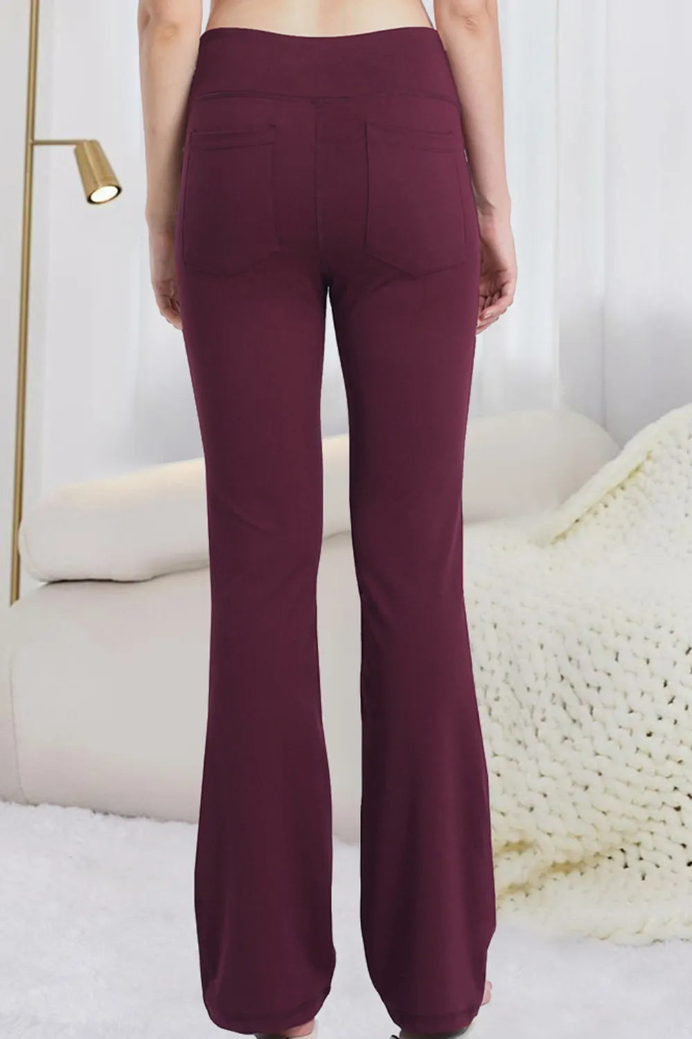 High-waisted flare yoga pants with side phone pockets