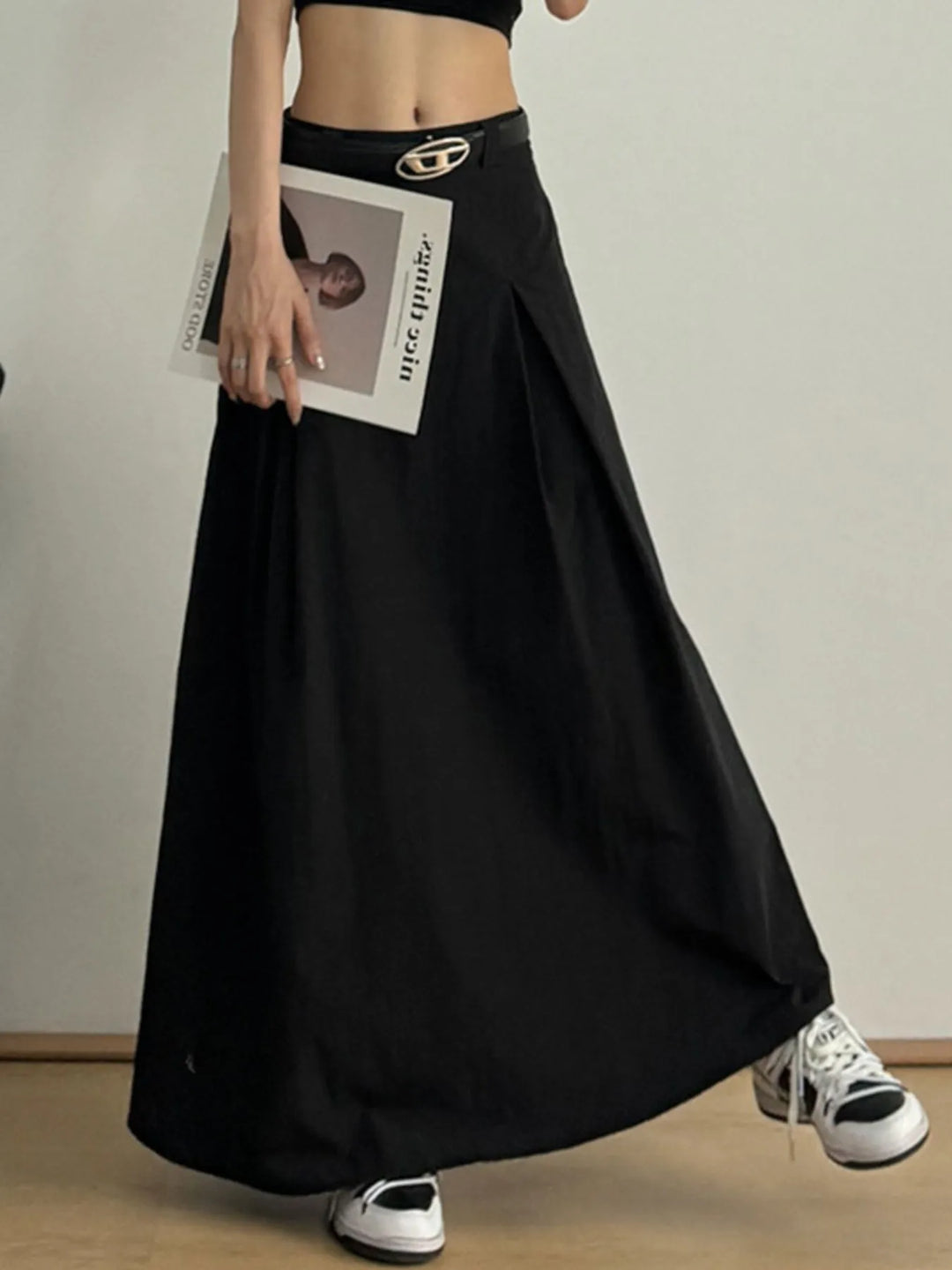 Black High-rise A-line maxi skirt with front pleats
