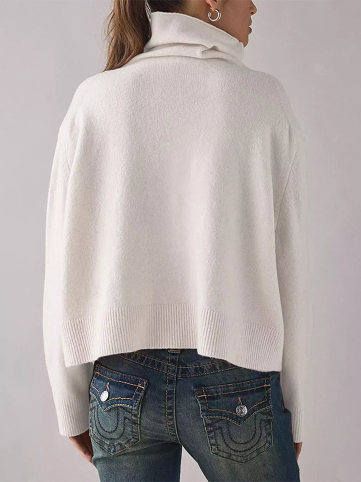 Turtleneck drop shoulder sweater with ribbed hem