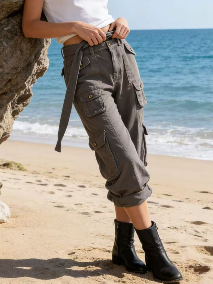 Wide-leg cargo jeans with tie belt and button-flap pockets