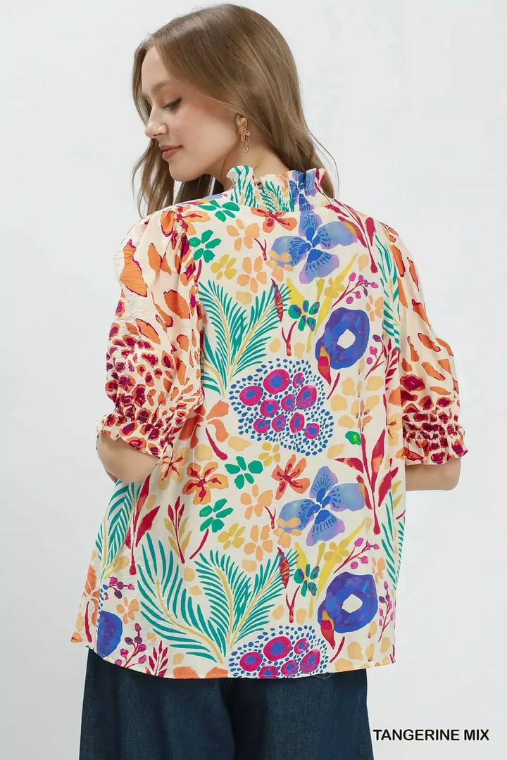 Floral print V-neck puff sleeve blouse with ruffle trim