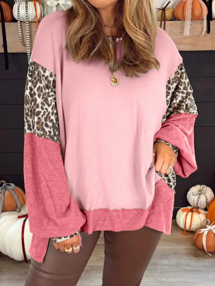 Blush Pink Leopard color block crew neck sweatshirt with exposed seams
