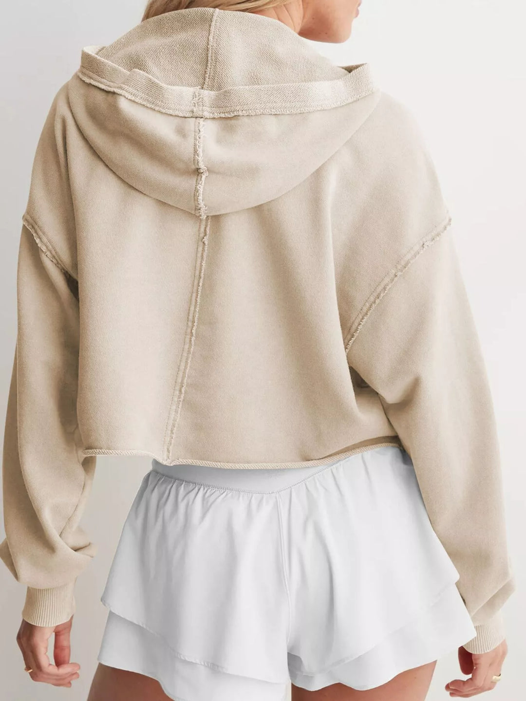 Cropped exposed-seam pullover hoodie with split neck