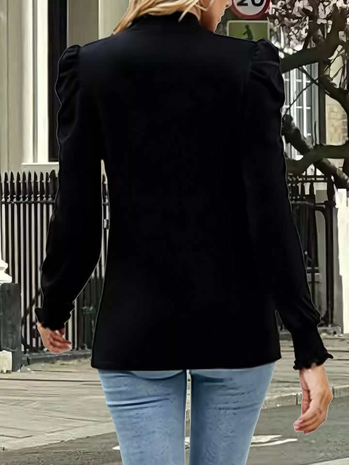 Mock neck puff sleeve blouse with smocked cuffs