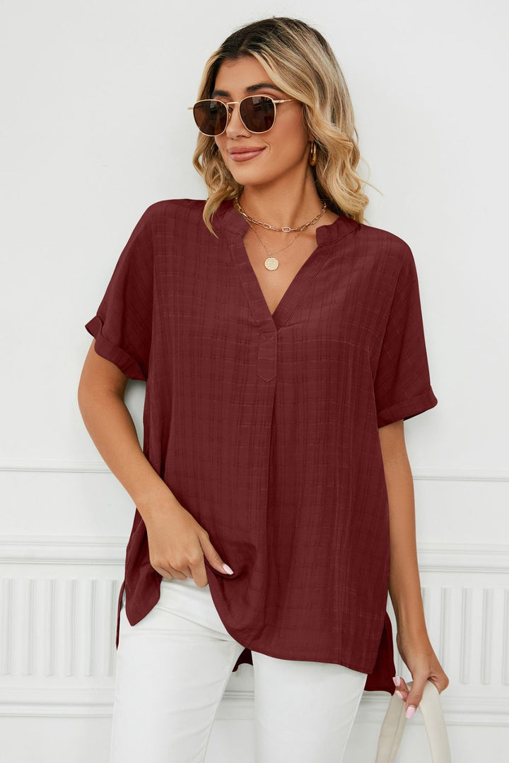 Notched neck cuffed short sleeve blouse with side slits