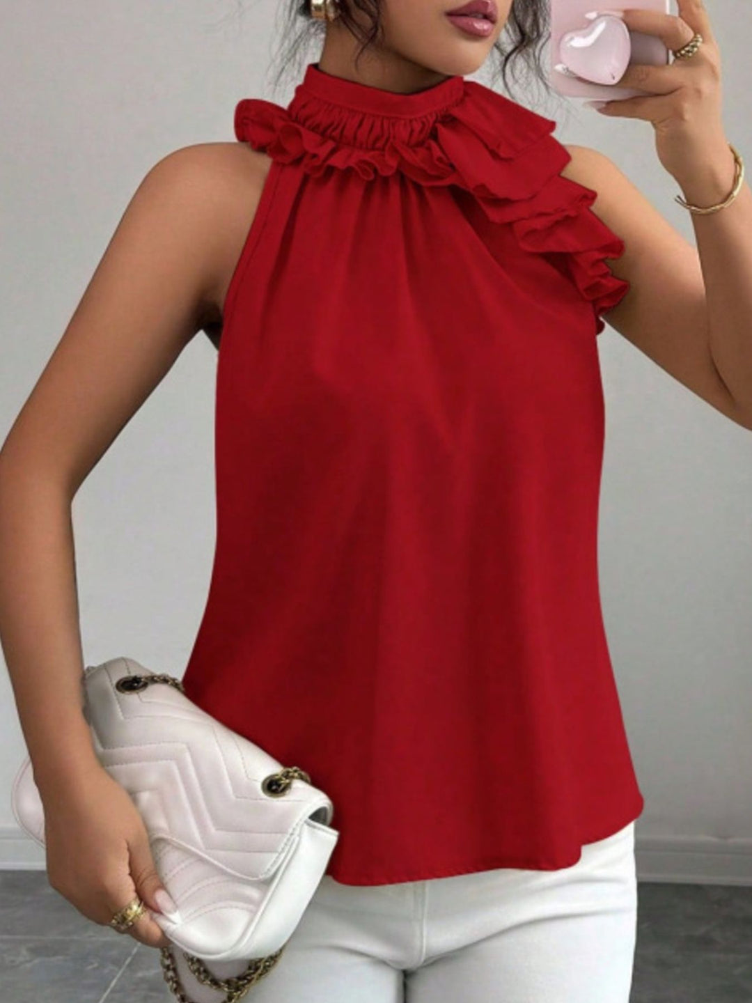 Flowy ruffle-trim high-neck sleeveless blouse