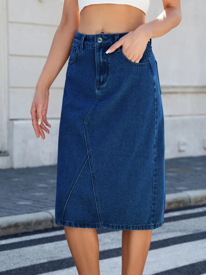 High-rise midi denim skirt with back slit and front pockets