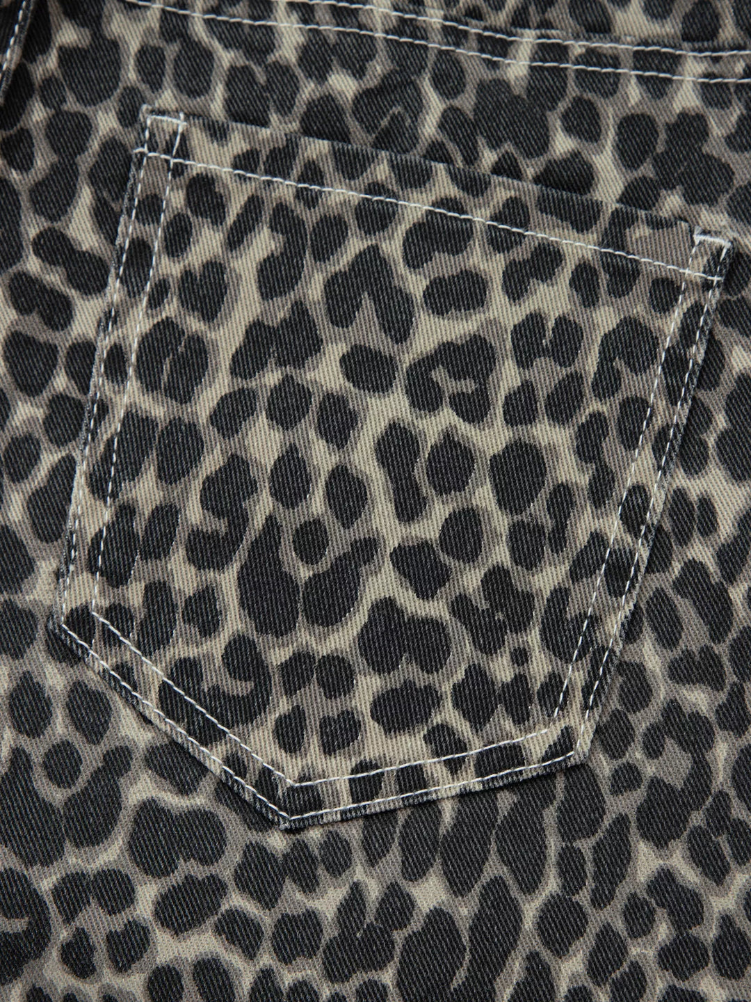 Leopard print high-rise barrel-leg jeans with pockets