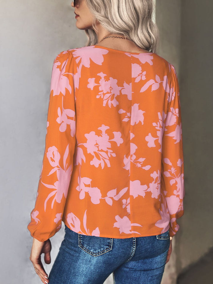 Floral print tie neck long sleeve blouse