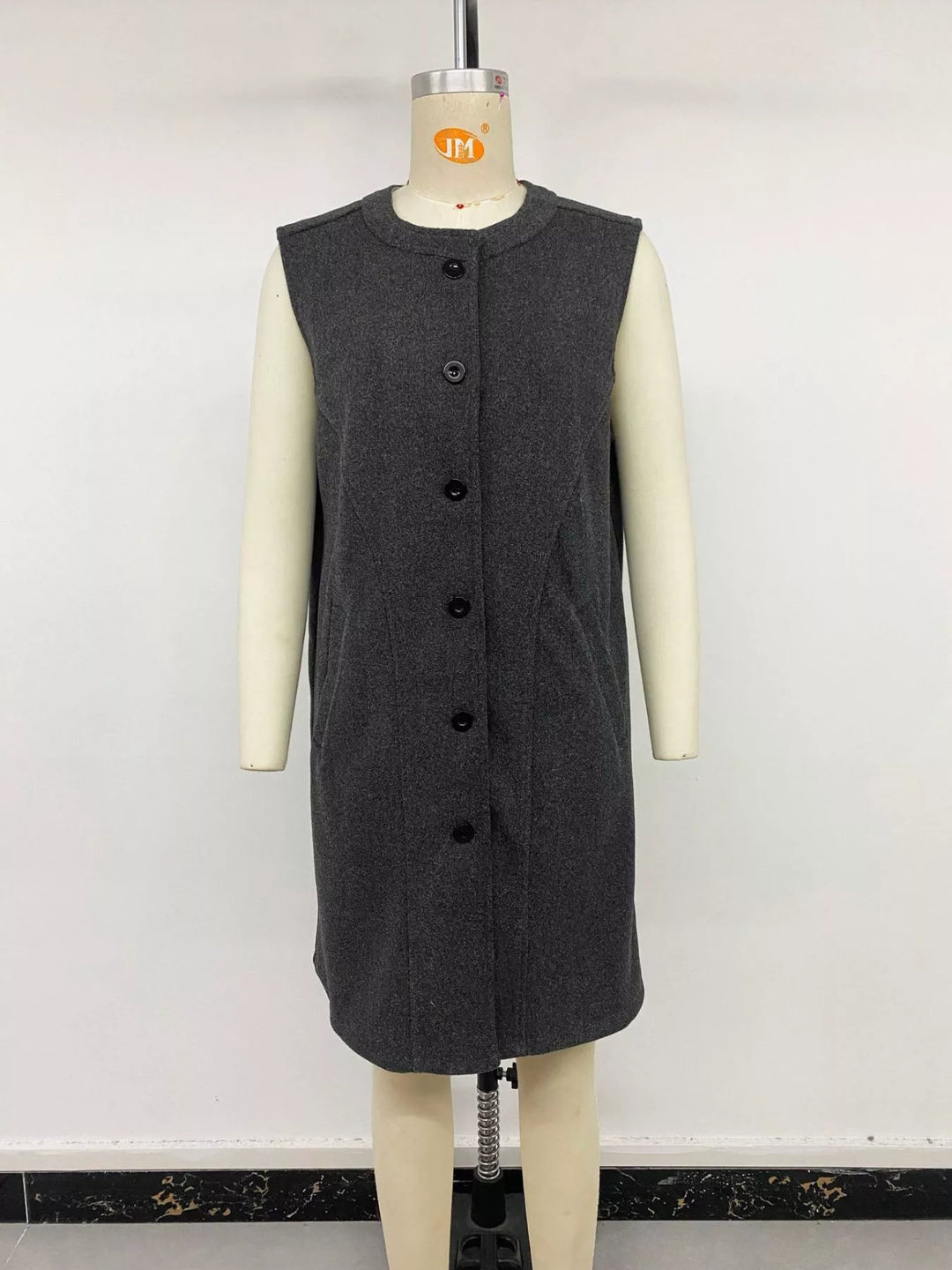 Longline sleeveless button-front vest coat
