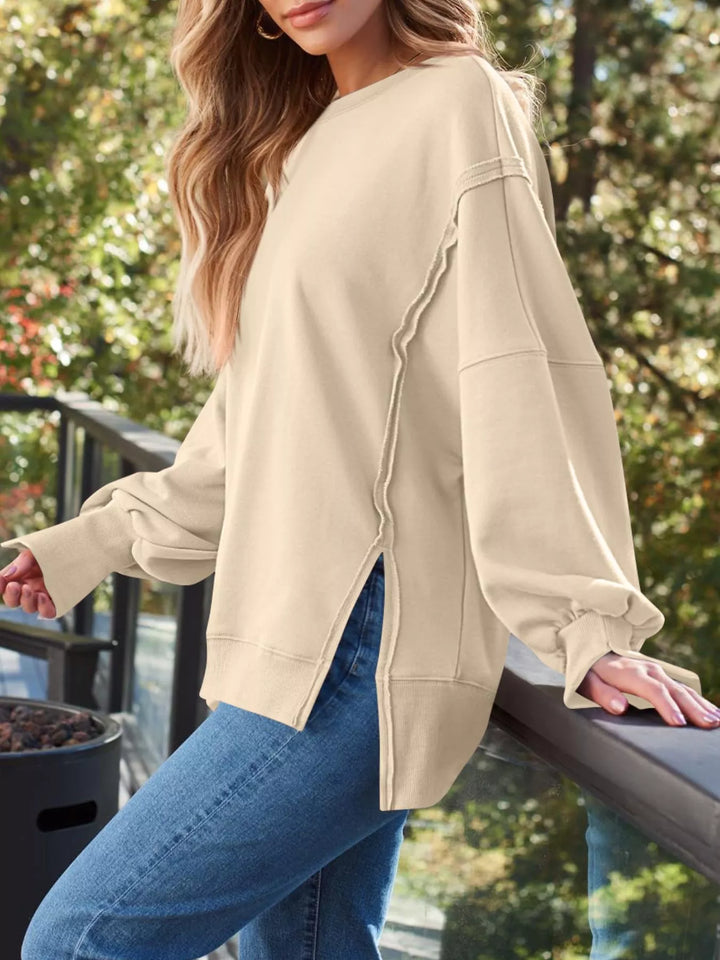 Oversized side-slit sweatshirt with exposed seams