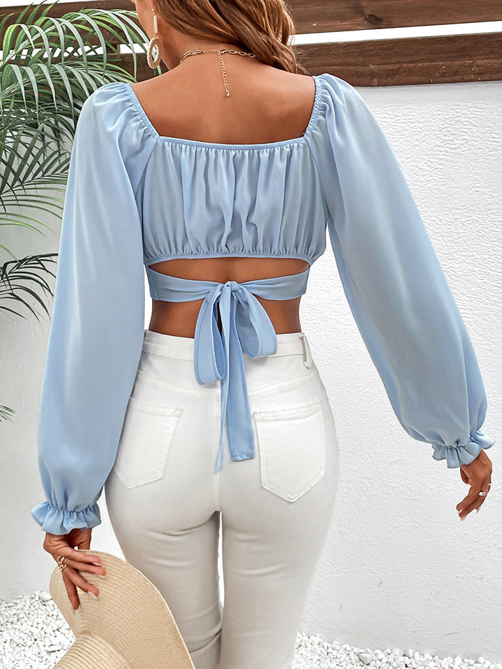 Ruched tie-front cropped blouse with raglan sleeves