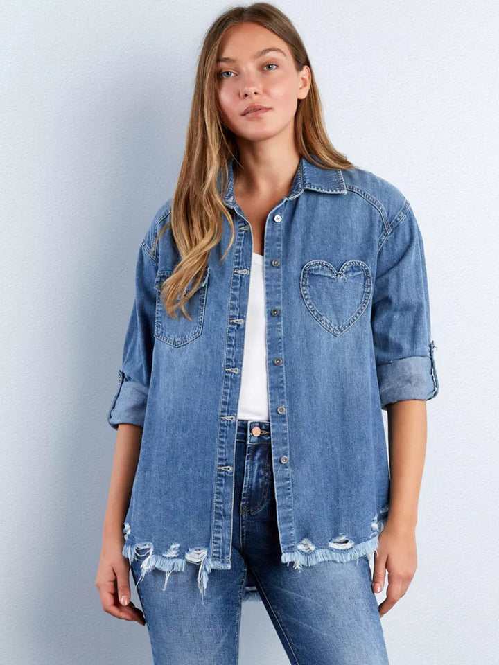 Oversized denim shirt with heart pocket and frayed hem