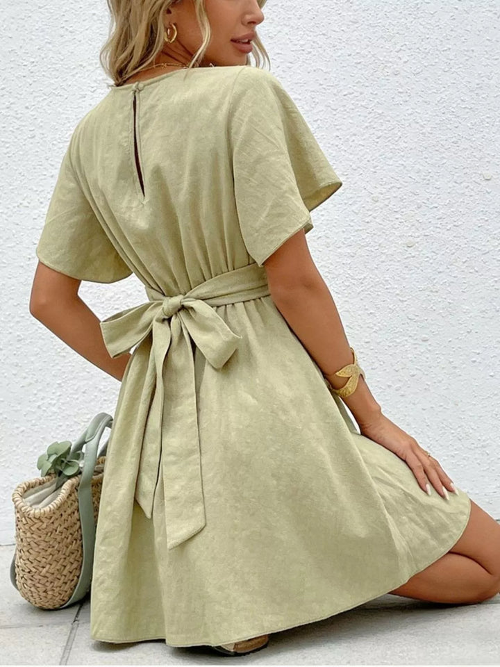 Twist-waist flutter sleeve V-neck mini dress