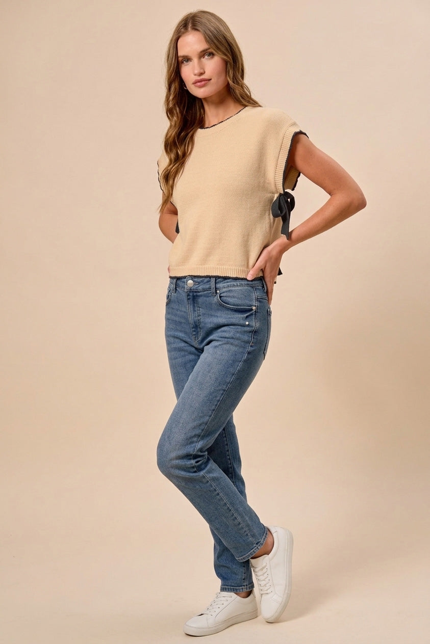 Dolman knit sweater top with contrast trim and side ribbon ties