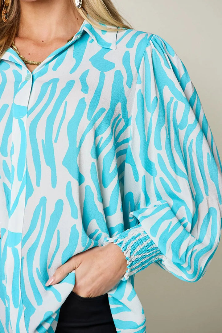 Zebra print smocked-cuff long sleeve blouse