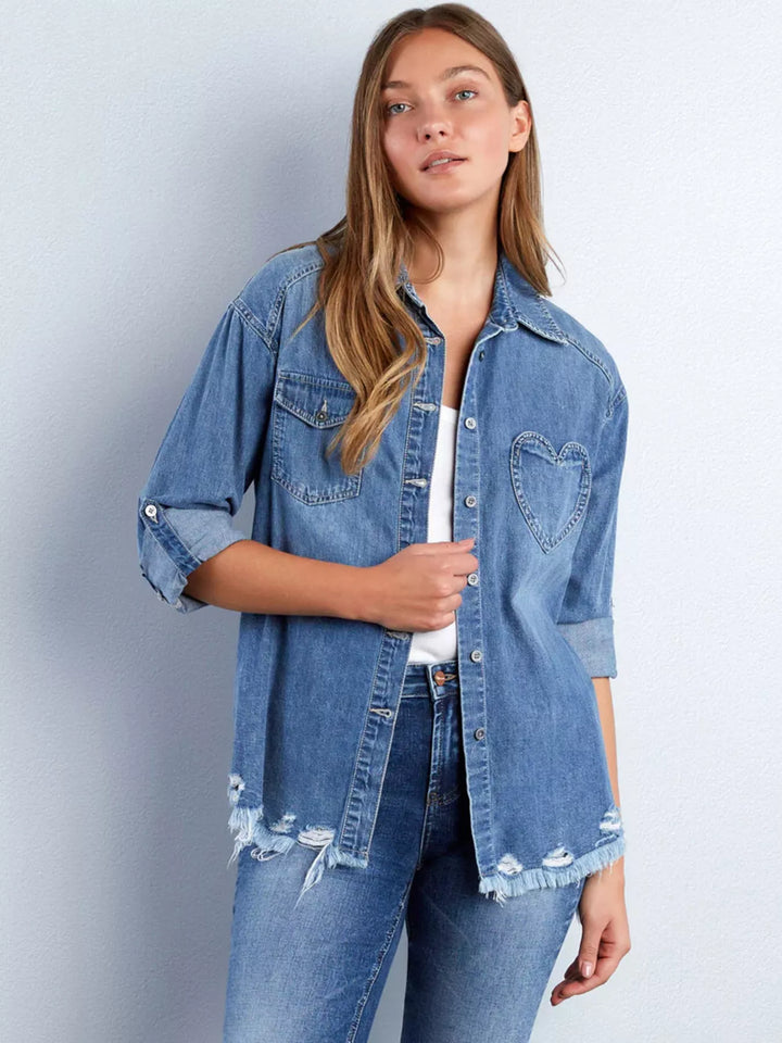 Oversized denim shirt with heart pocket and frayed hem
