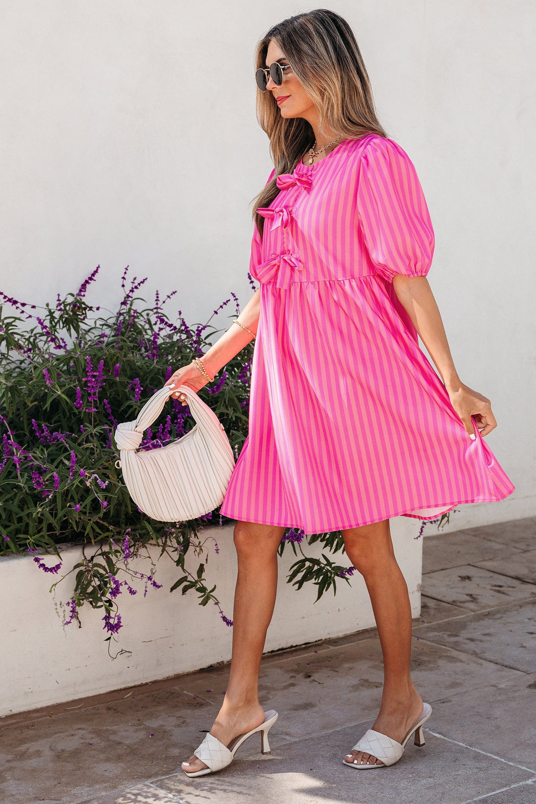 Striped puff sleeve mini dress with triple bow front