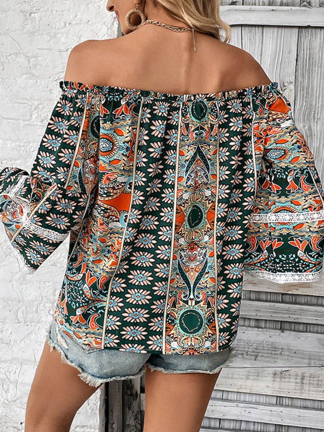 Boho print off-shoulder blouse with frill trim and flutter sleeves