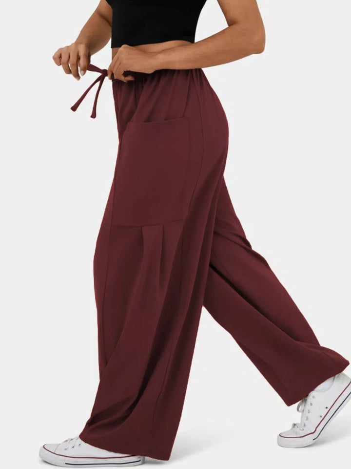 High-rise drawstring wide-leg pants with patch pockets