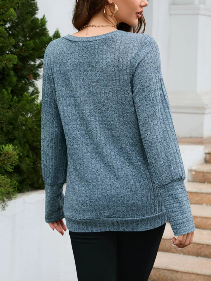 Ribbed knit V-neck long sleeve top with drop shoulders
