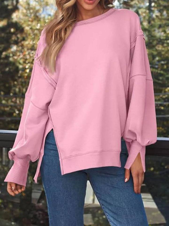 Oversized side-slit sweatshirt with exposed seams