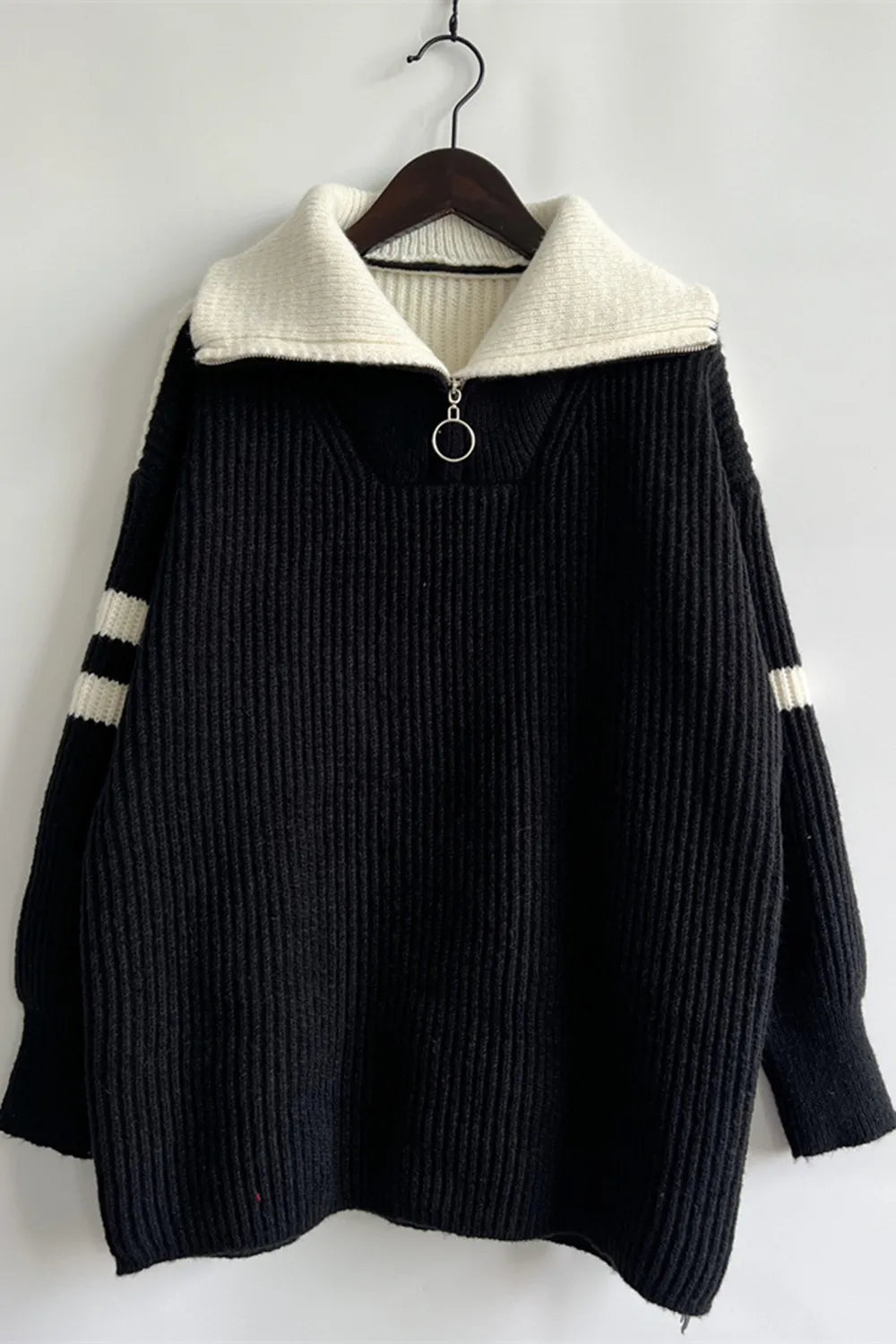 Quarter-zip ribbed knit sweater with striped sleeves