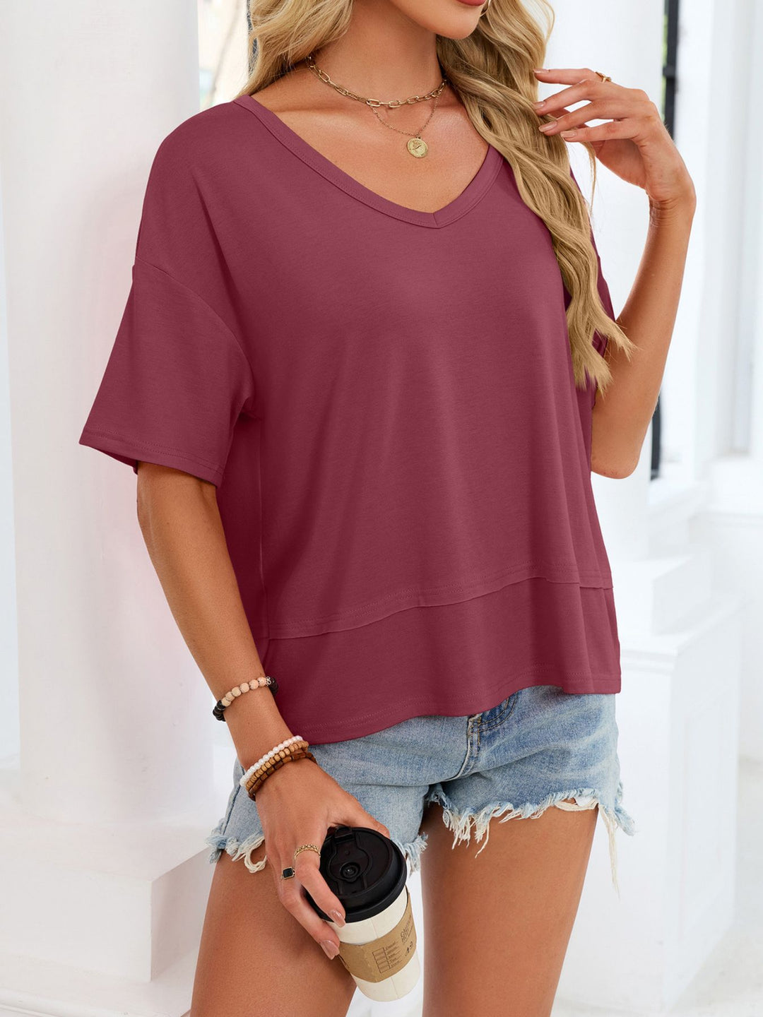 Relaxed-fit V-neck short sleeve tee with raw hem