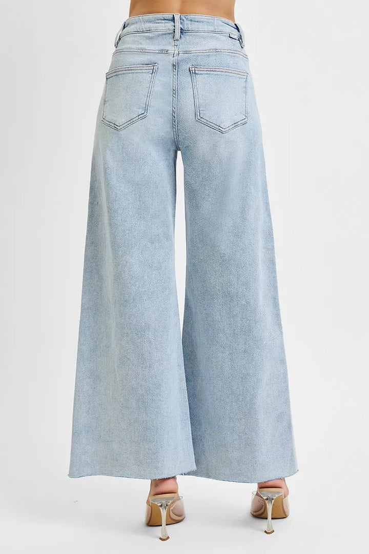 High-rise wide-leg palazzo jeans with raw ankle hem