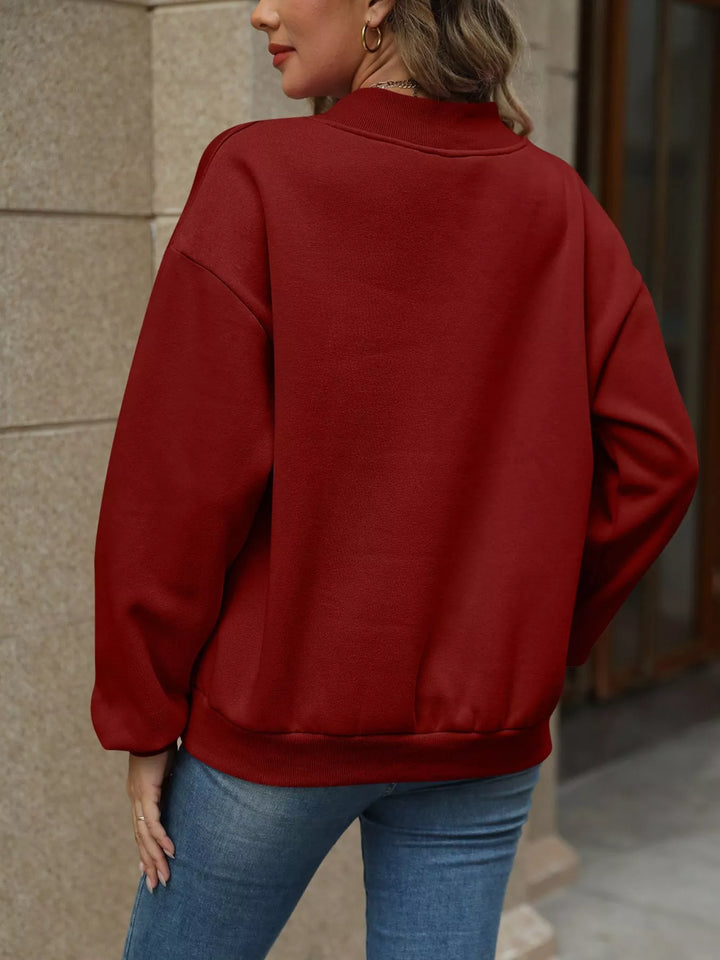 V-neck drop-shoulder pullover sweatshirt with ribbed trim