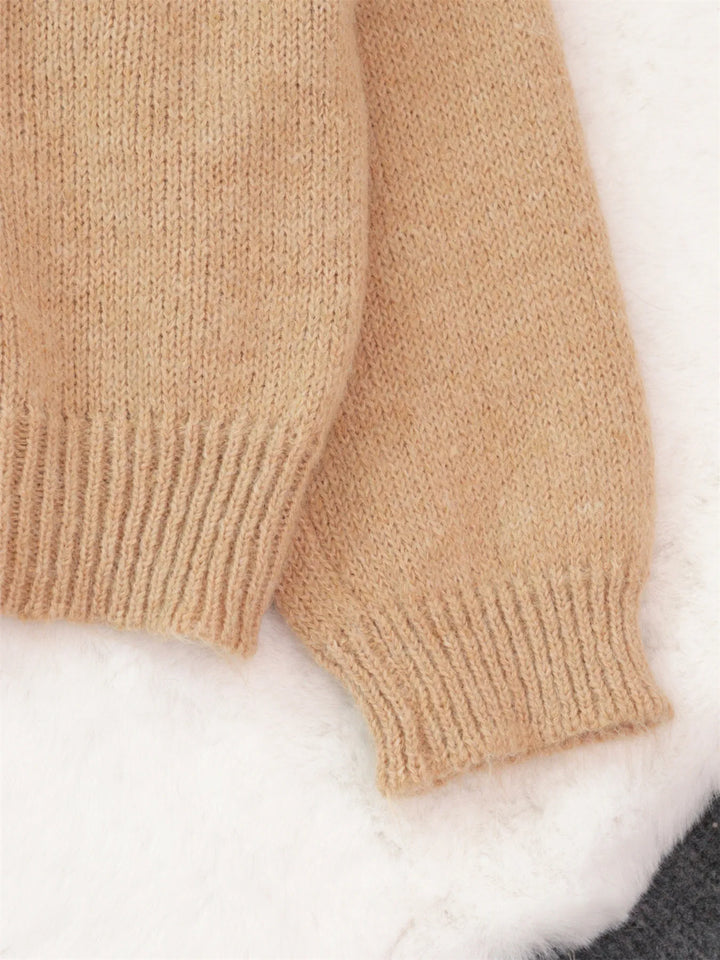 Sequined diamond pointelle knit oversized sweater