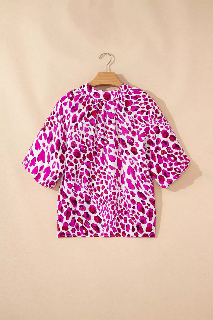 Leopard print V-neck blouse with puff sleeves