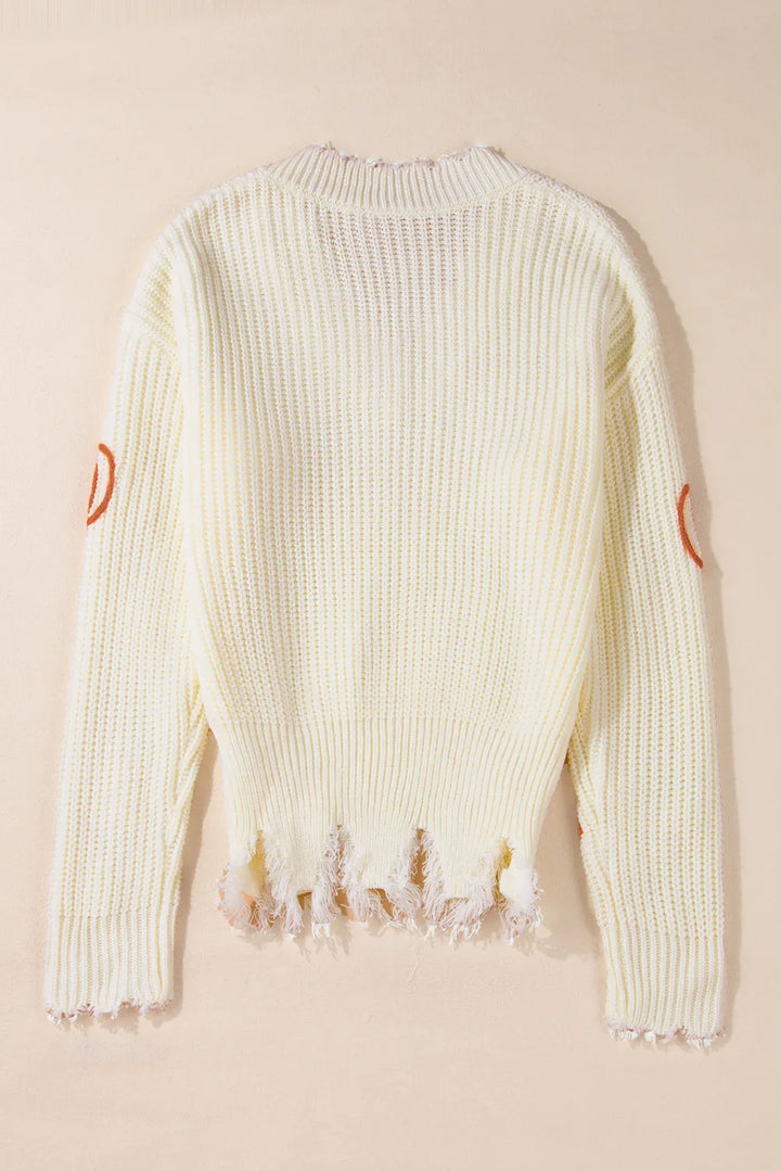 Pumpkin embroidered chunky knit sweater with frayed raw hem