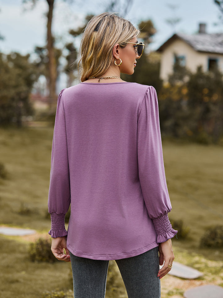 Pintuck pleated puff sleeve blouse with smocked cuffs