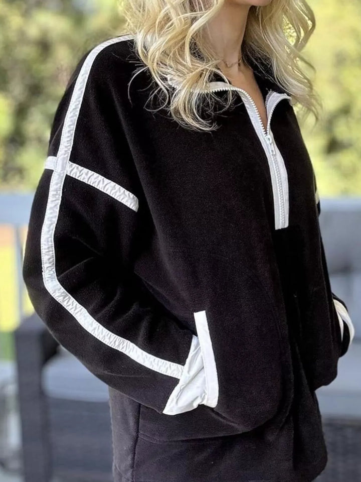 Black Half-zip fleece pullover with contrast trim and zip pockets
