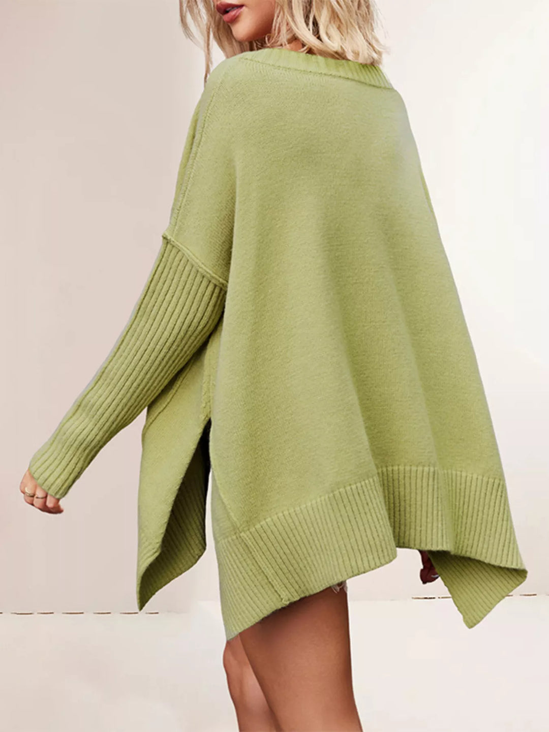 Oversized ribbed-sleeve V-neck tunic sweater with side slits