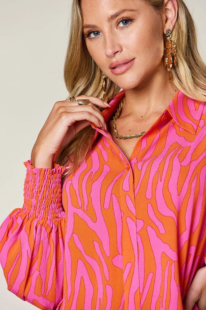 Zebra print smocked-cuff long sleeve blouse