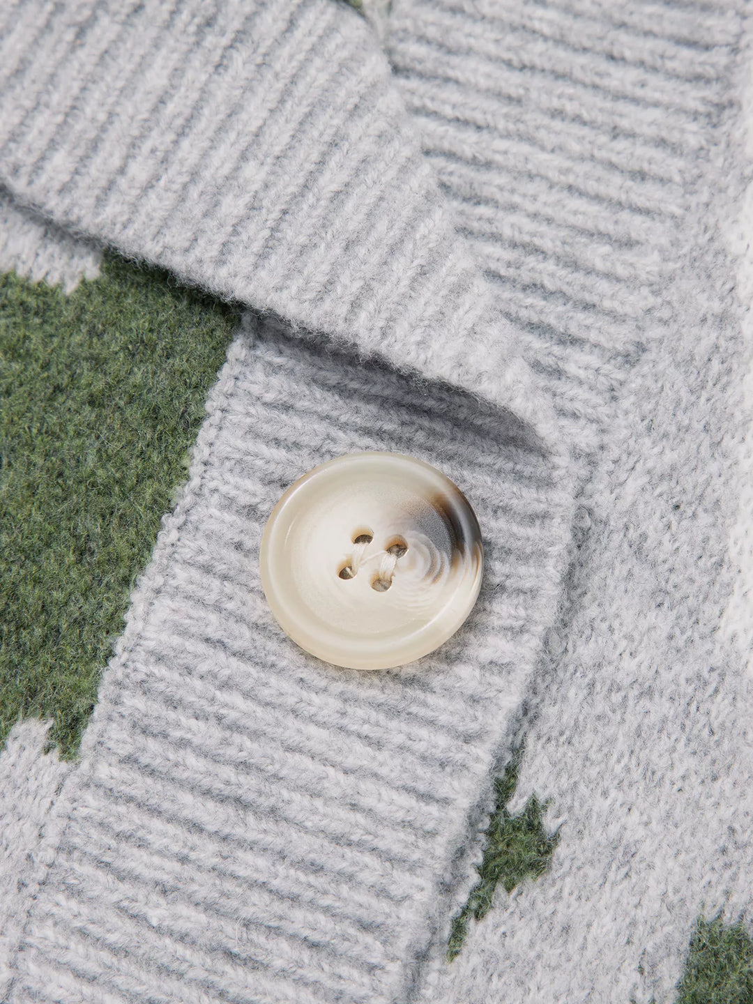 Camo knit drop shoulder cardigan with button front and pockets