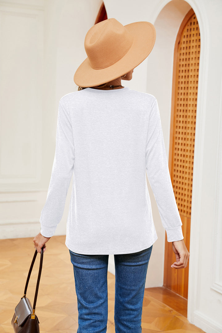 Notch neck long sleeve top with button placket