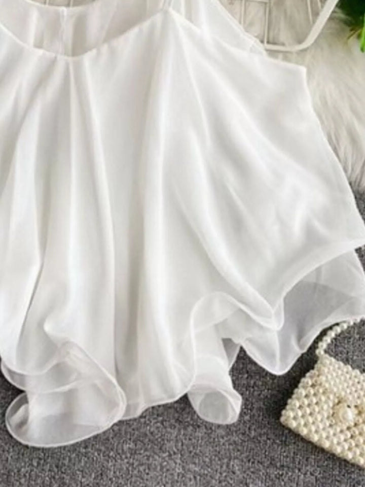 Flowy chiffon cami with ruffled hem and V-neck